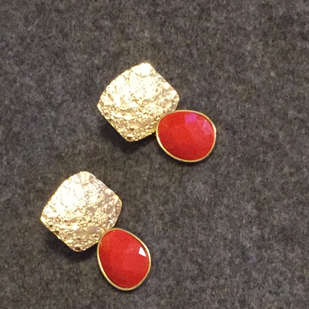 Gold and red colored stud earrings